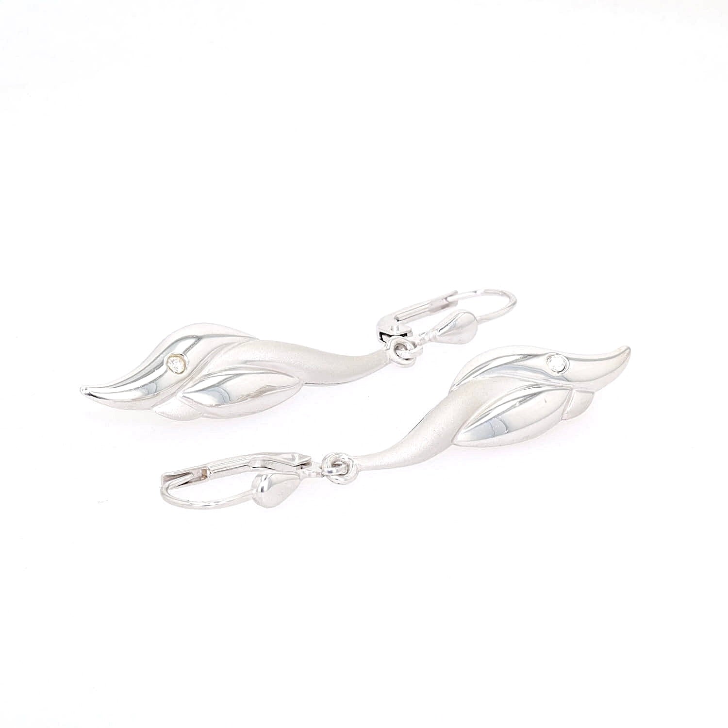 Pair of simple earrings in 333 white gold, each with a white cubic zirconia, turned horizontally to the right