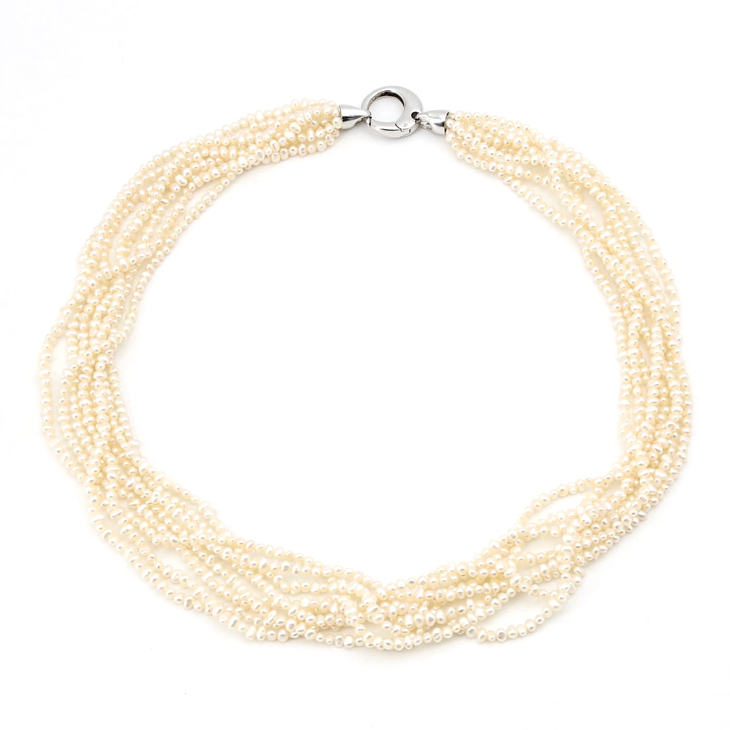Necklace with 8 intertwined rows of cultured pearls and a silver lock, horizontal top view