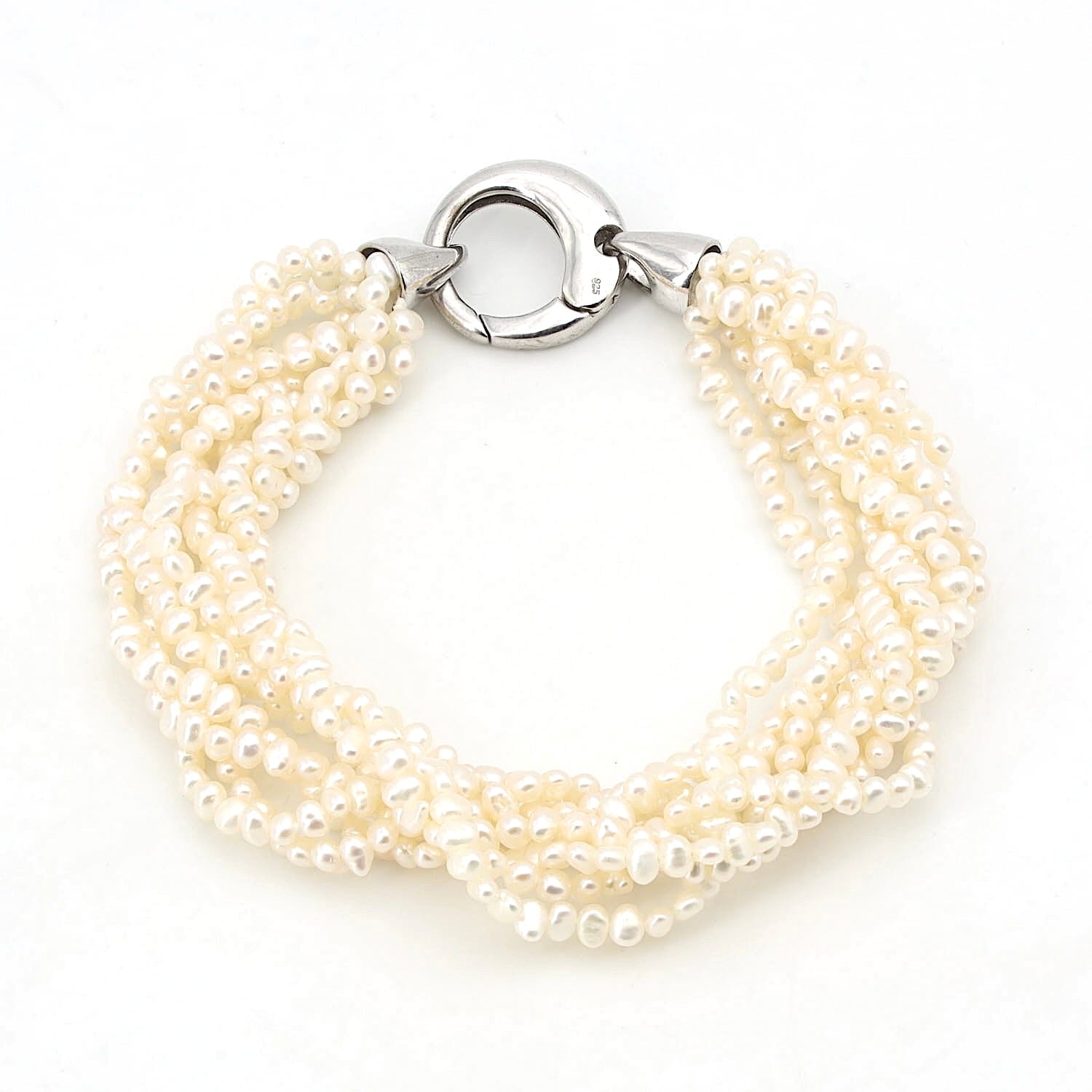 Bracelet with 8 intertwined rows of cultured pearls and a silver lock, horizontal top view