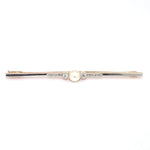 Pin in 585 rose gold, platinum-plated with cultured pearl and diamonds, lying frontally