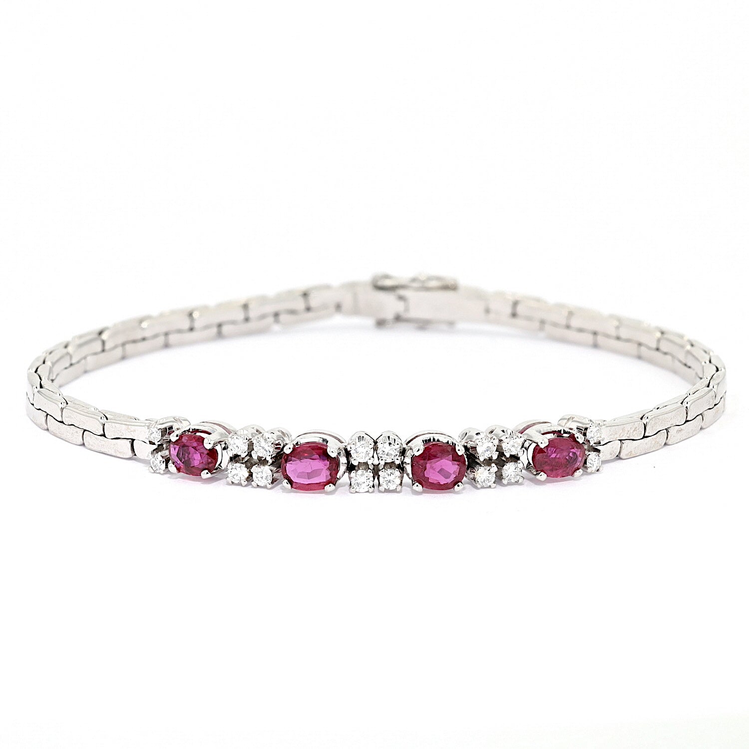 Bracelet in 750 white gold with brilliants and rubies, lying frontally