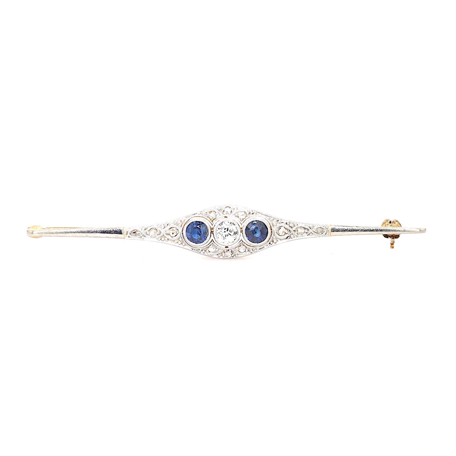 Art Déco brooch in 585 gold and platinum with diamonds and sapphires, lying frontally