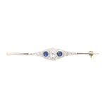 Art Déco brooch in 585 gold and platinum with diamonds and sapphires, lying frontally