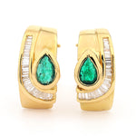 1 pair of stud earrings in 18 kt yellow gold with diamonds and emeralds, standing frontal