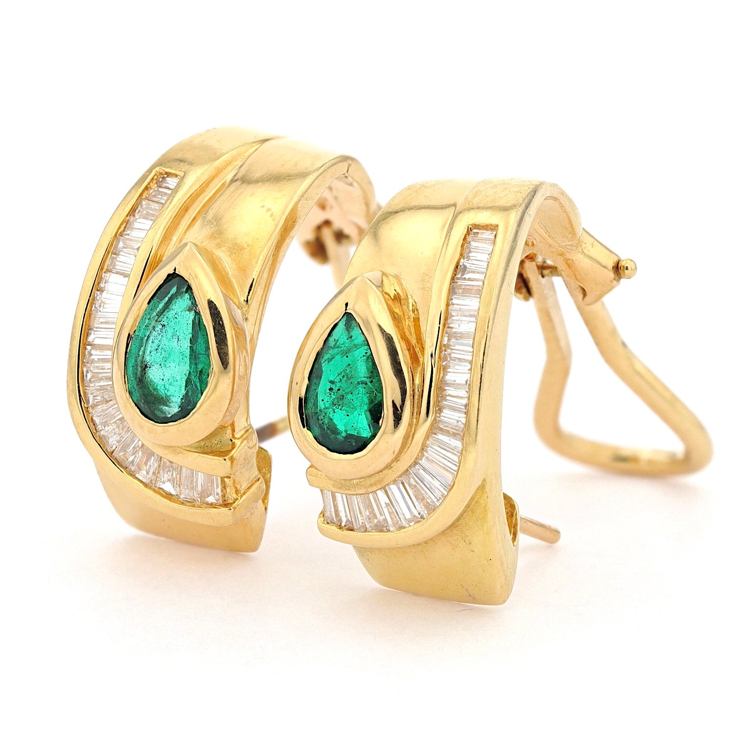 1 pair of stud earrings in 18 kt yellow gold with diamonds and emeralds, standing inks turned