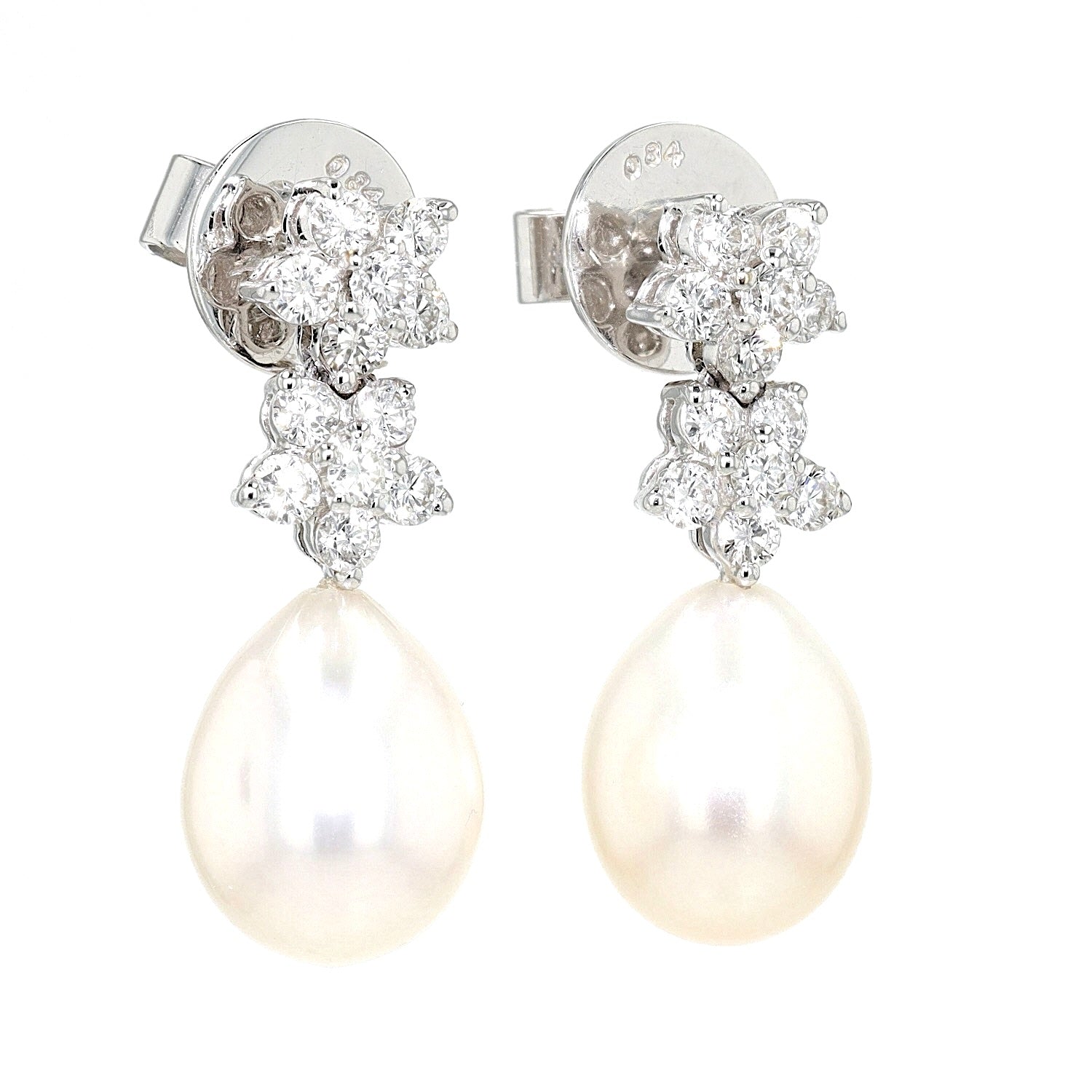 Earrings in 750 white gold with cultured pearls and brilliants, hanging turned to the right