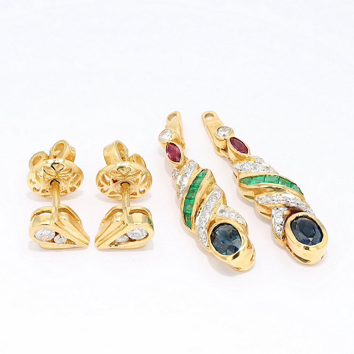 1 pair of earrings in 750 yellow gold with brilliants, rubies, sapphires and emeralds, horizontal top view