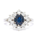 Ring in 750 white gold with a sapphire and brilliants, lying frontally