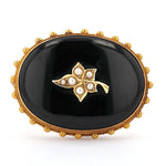 Victorian brooch in 9 ct yellow gold with onyx and seed pearls, lying frontally