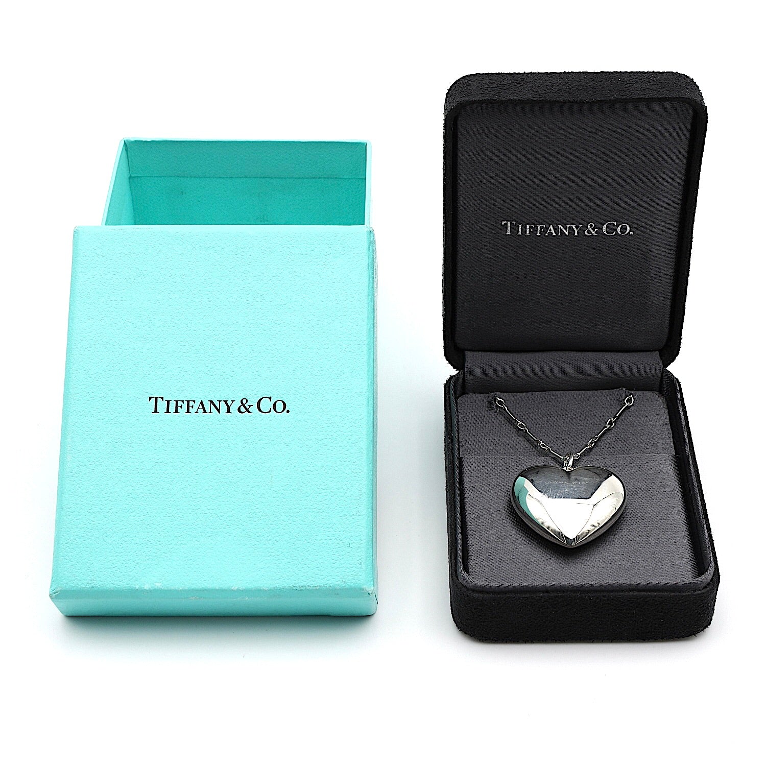 Tiffany & Co. Pendant and chain in 925 silver, chain and pendant in original box and with box