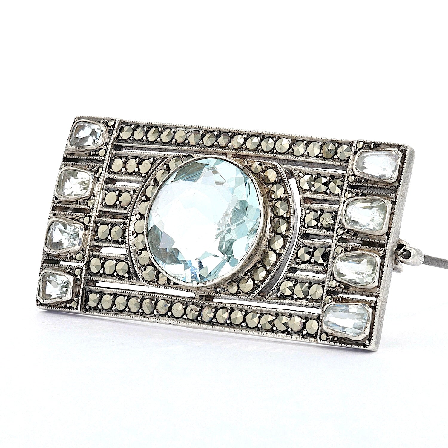 Art Deco brooch in 925 silver with aquamarines and marcasites, turned horizontally to the left