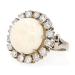 Cocktail ring in 585 white gold with a large opal cabochon and approx. 1.28 ct brilliants, turned horizontally to the left