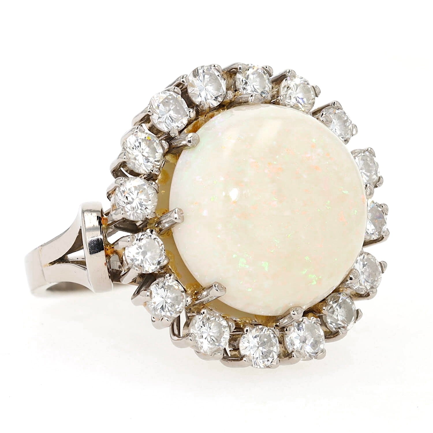 Cocktail ring in 585 white gold with a large opal cabochon and approx. 1.28 ct brilliants, turned horizontally to the right