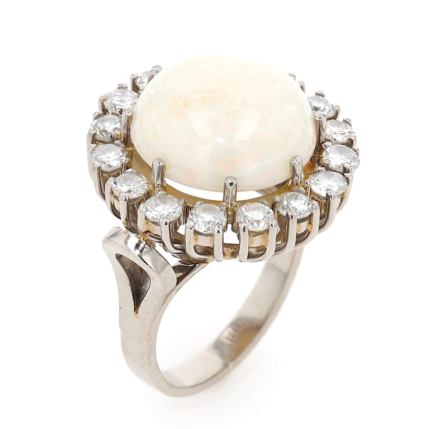 Cocktail ring in 585 white gold with a large opal cabochon and approx. 1.28 ct brilliants, standing