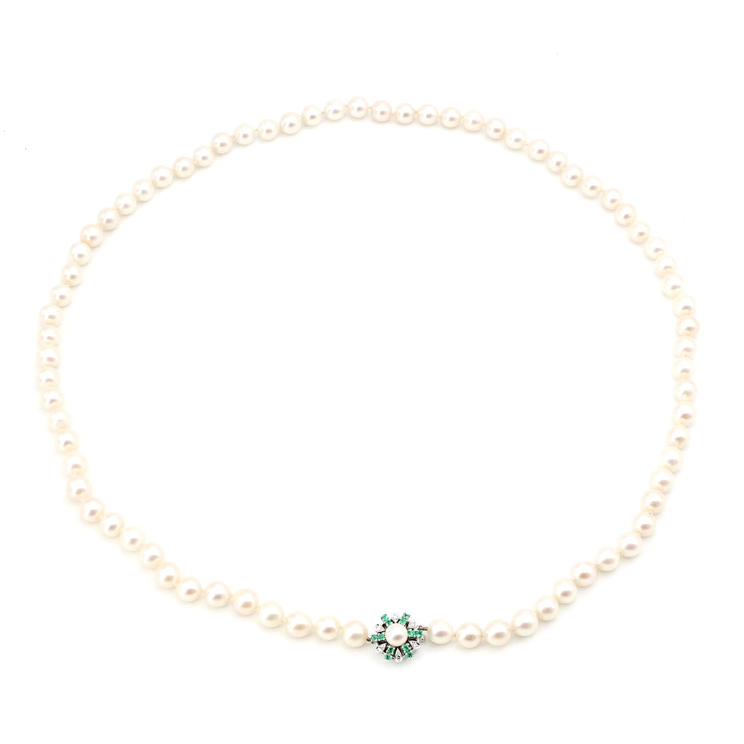 Akoya cultured pearl necklace with a 585 white gold clasp with diamonds and emeralds, horizontal top view