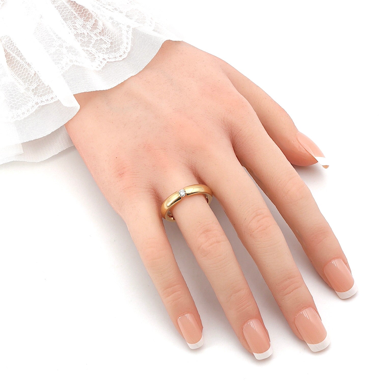 Tension ring by Christ in 585 yellow gold with a brilliants, on the hand