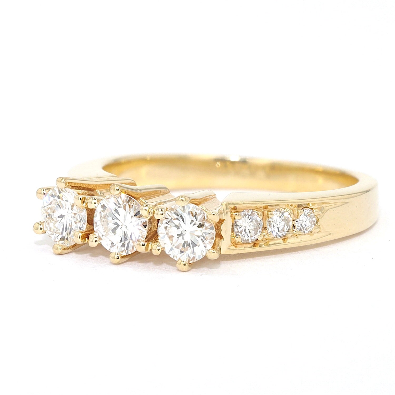 3-stone engagement ring in 585 yellow gold with approx. 0.66 ct brilliants, turned horizontally to the left