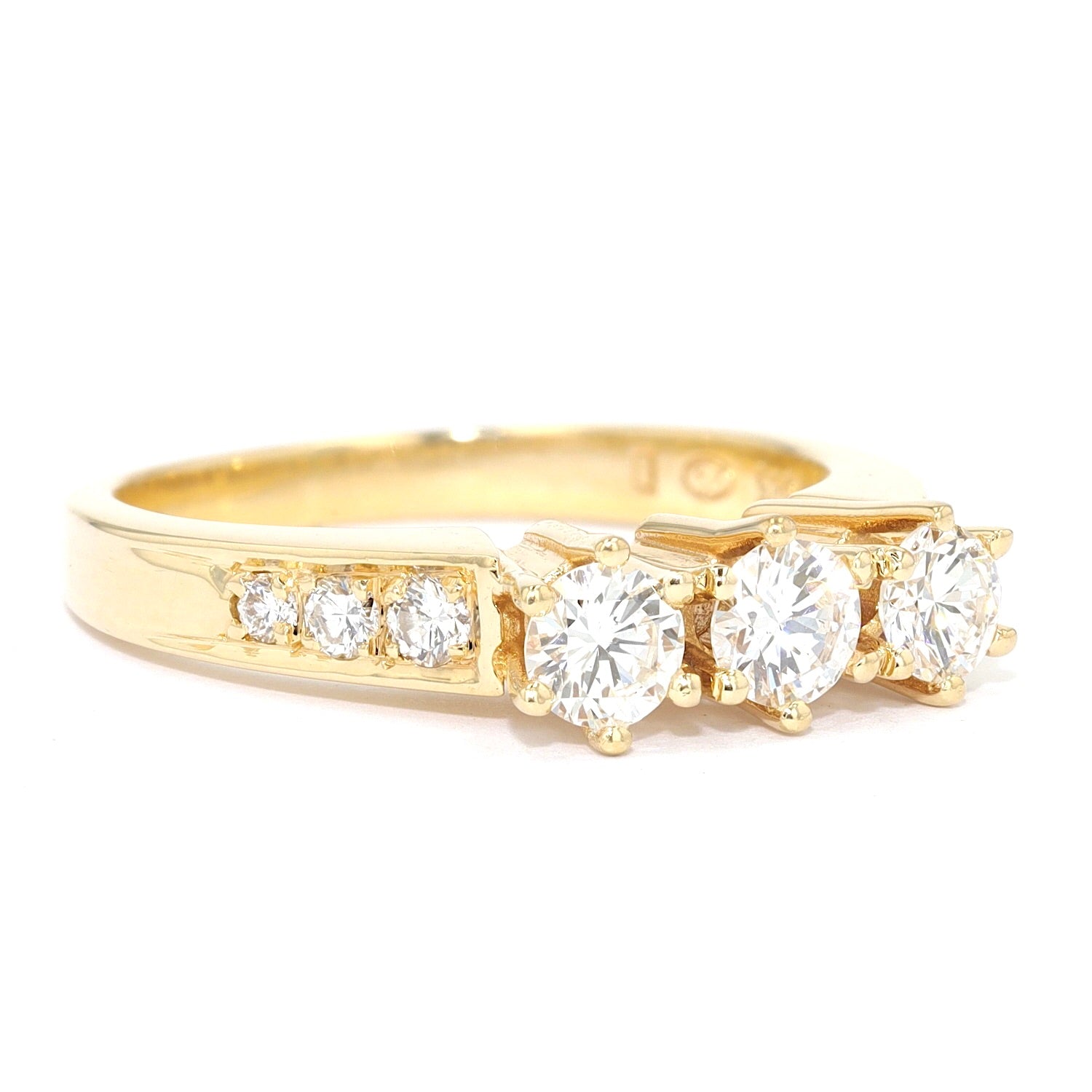 3-stone engagement ring in 585 yellow gold with approx. 0.66 ct brilliants, turned horizontally to the right