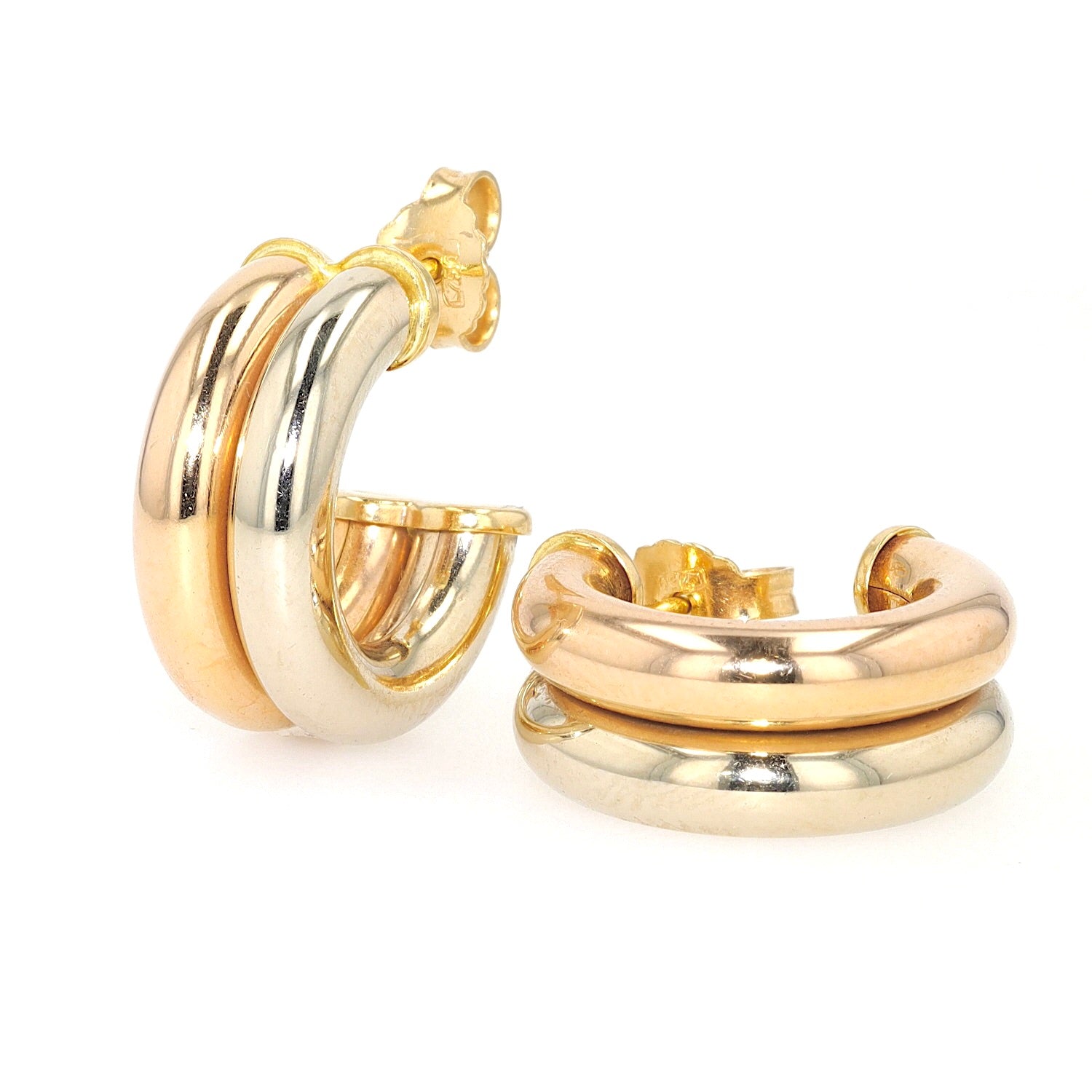 1 pair of half hoop earrings in 750 bicolor gold, standing and lying turned to the left