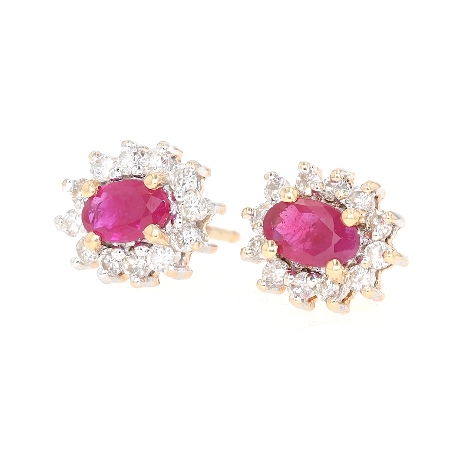 1 pair of stud earrings in 585 bicolor gold with brilliants and rubies, turned horizontally to the left