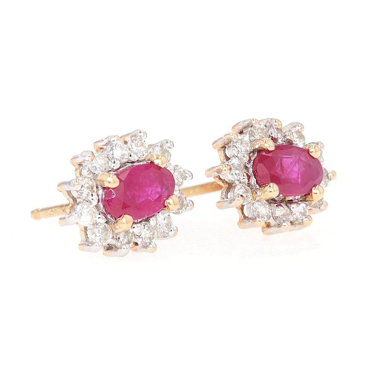 1 pair of stud earrings in 585 bicolor gold with brilliants and rubies, turned horizontally to the right