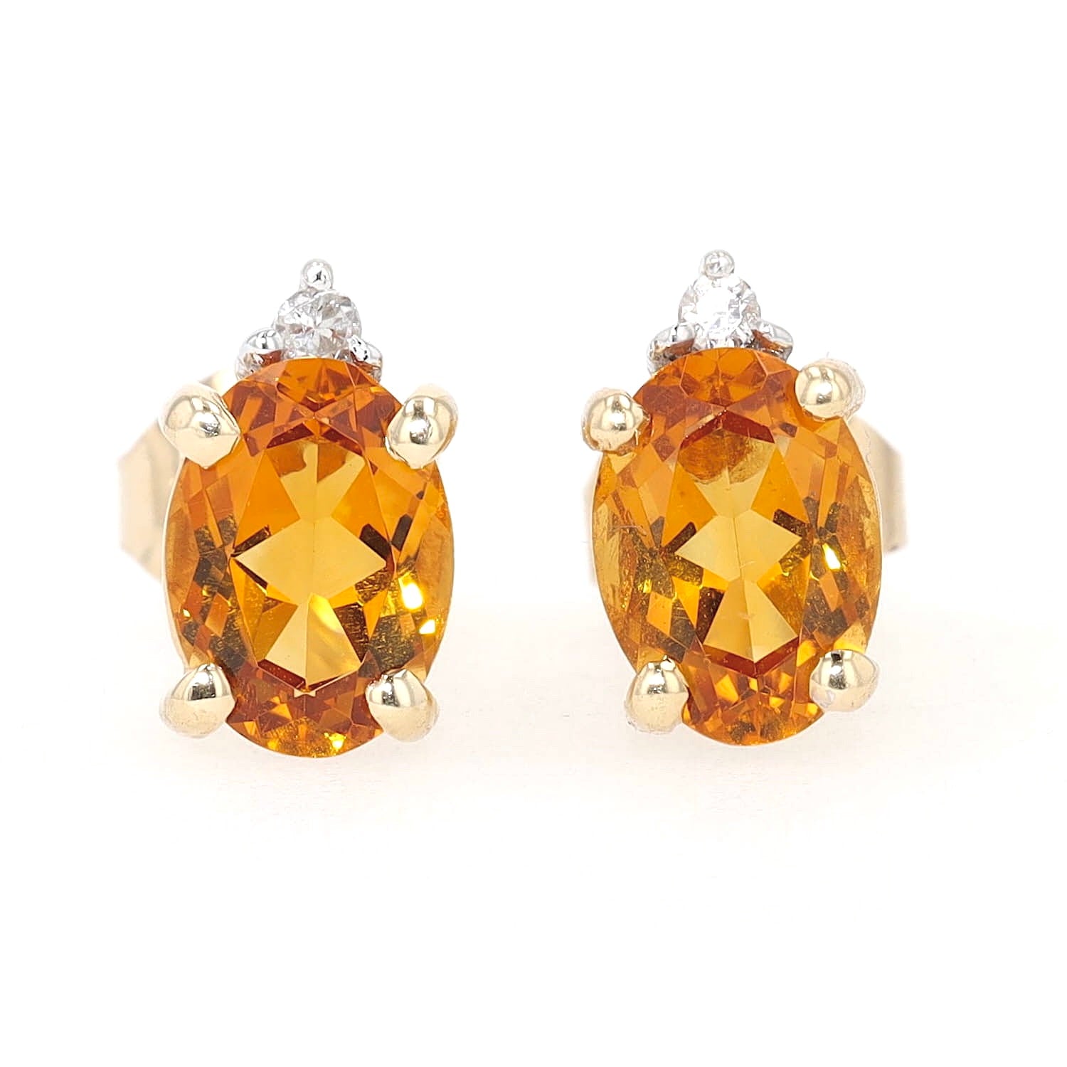 Pair of stud earrings in 585 bicolor gold with one citrine and one brilliants