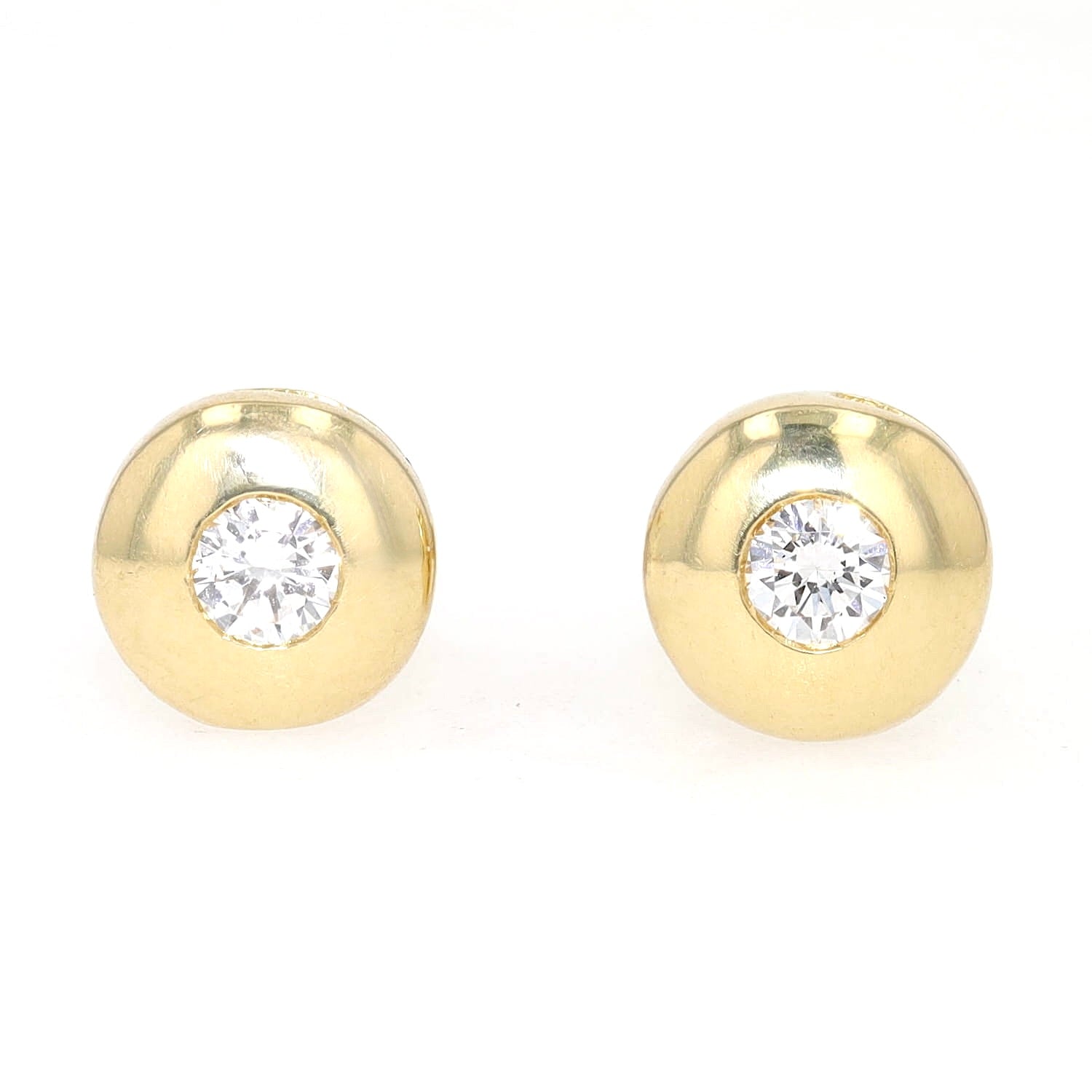 Pair of 750 yellow gold stud earrings, each with an approx. 0.12 ct brilliants, stopper 585 gold, lying frontally