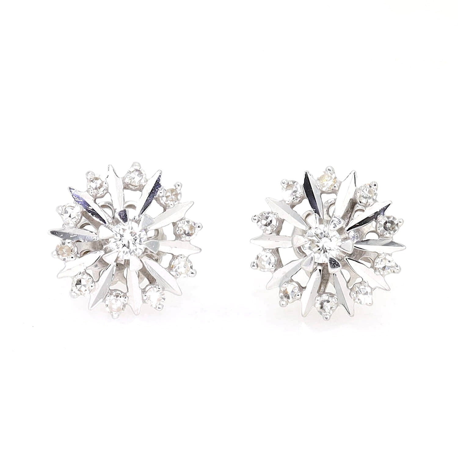 Vintage stud earrings in 585 white gold with brilliants and diamonds, lying frontal