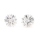 Vintage stud earrings in 585 white gold with brilliants and diamonds, lying frontal