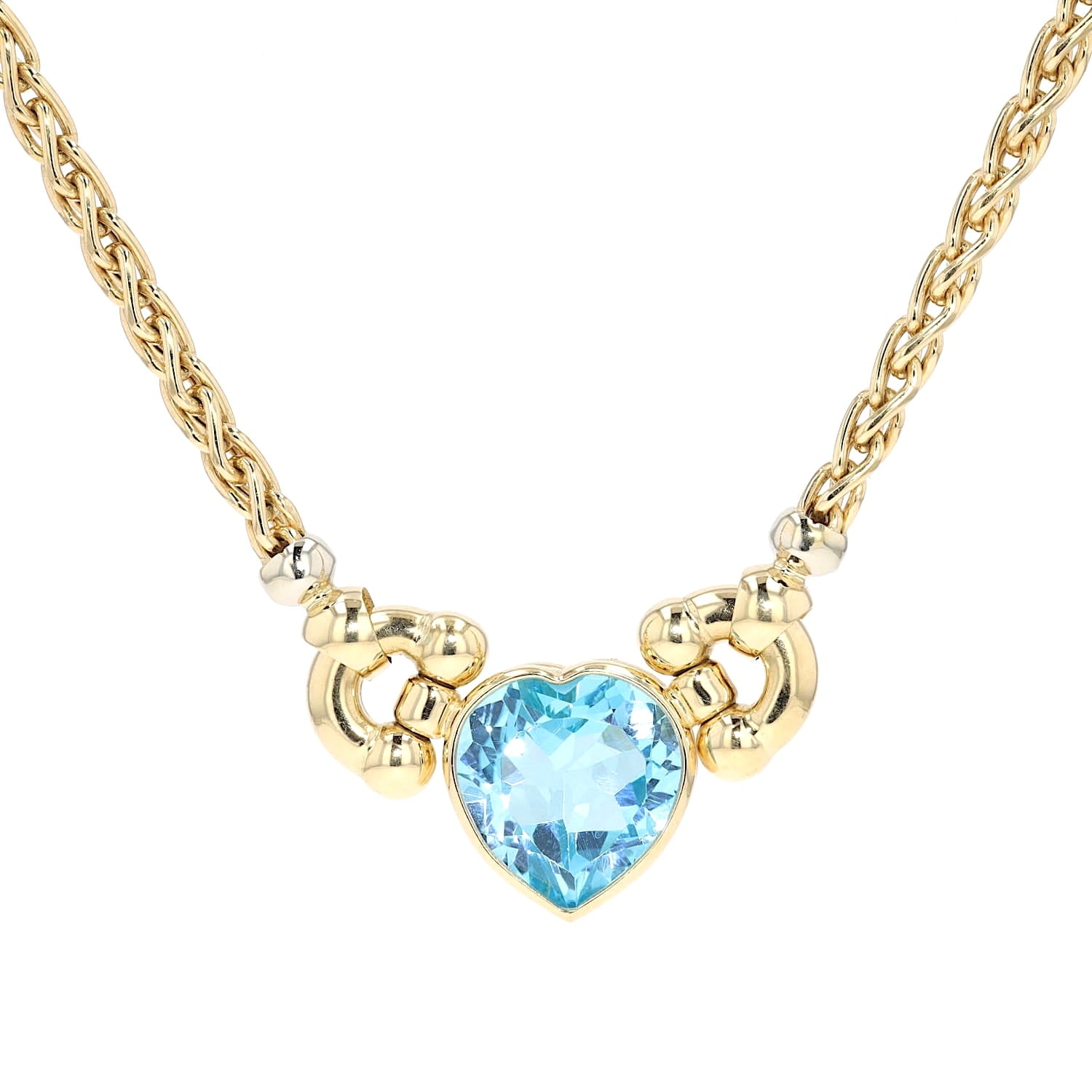 Sorelle Ronco necklace in 750 yellow gold with a blue topaz, hanging frontally