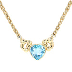 Sorelle Ronco necklace in 750 yellow gold with a blue topaz, hanging frontally