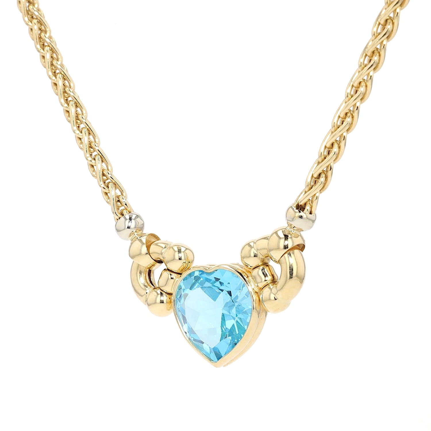 Sorelle Ronco necklace in 750 yellow gold with a blue topaz, hanging twisted left