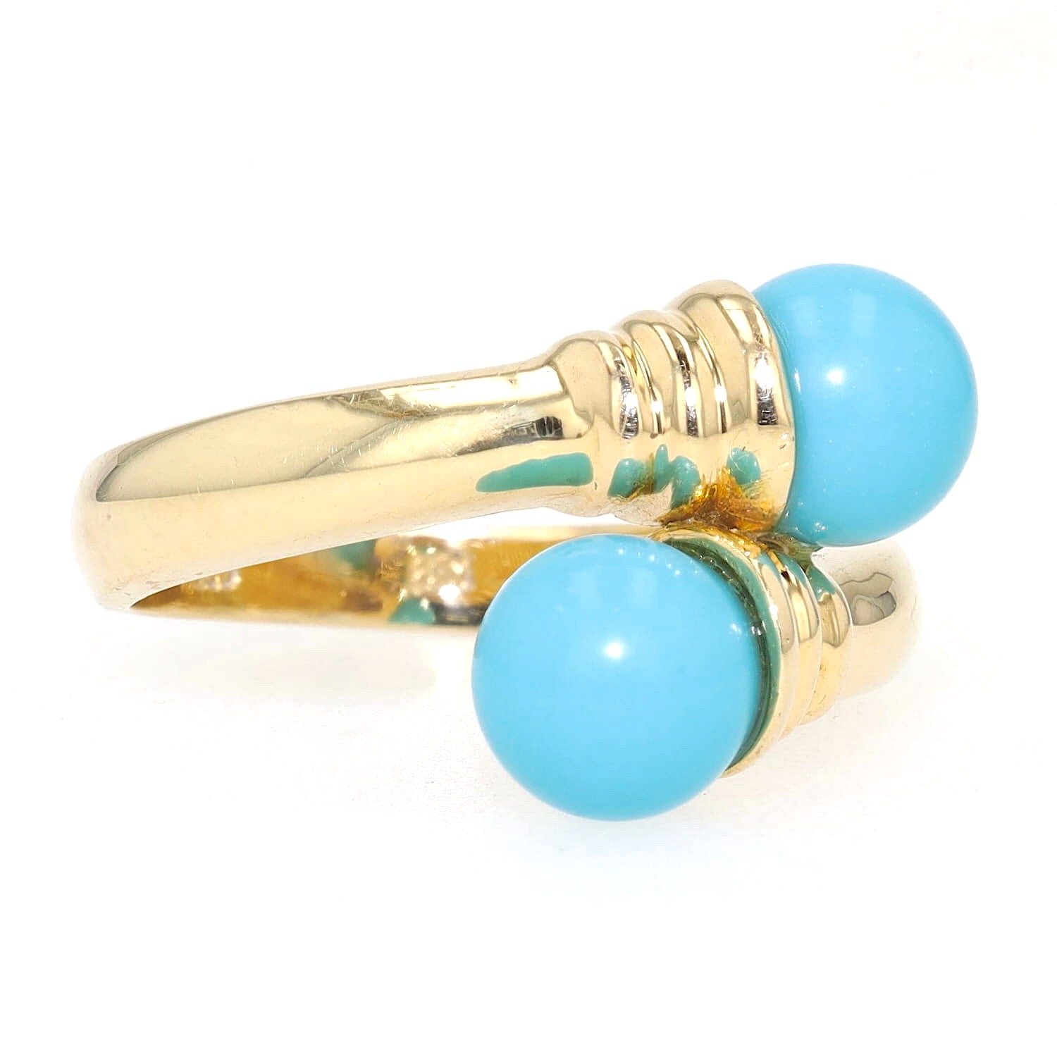 Ring in 585 yellow gold with two turquoise spheres, turned horizontally to the right