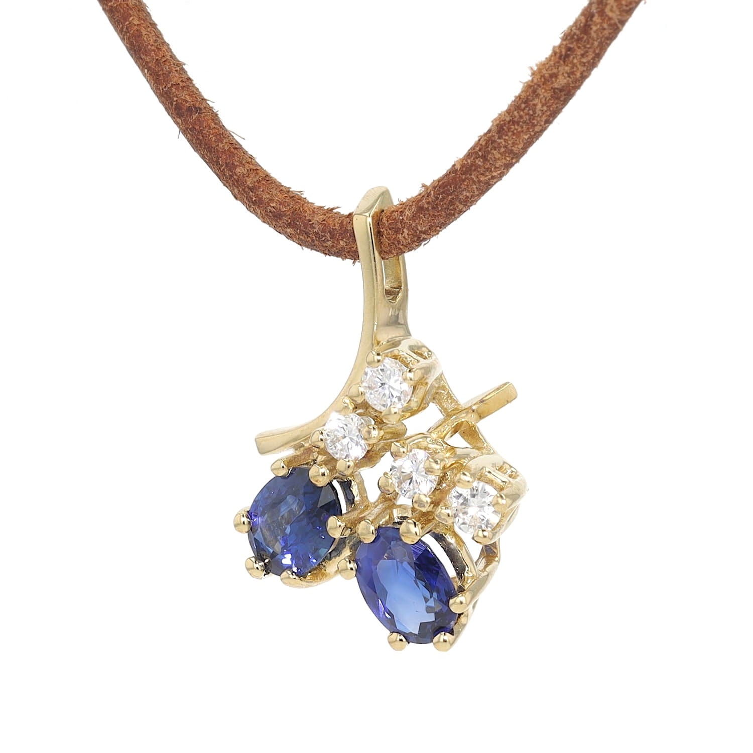 Pendant in 585 yellow gold with blue sapphires and brilliants, hanging turned to the left