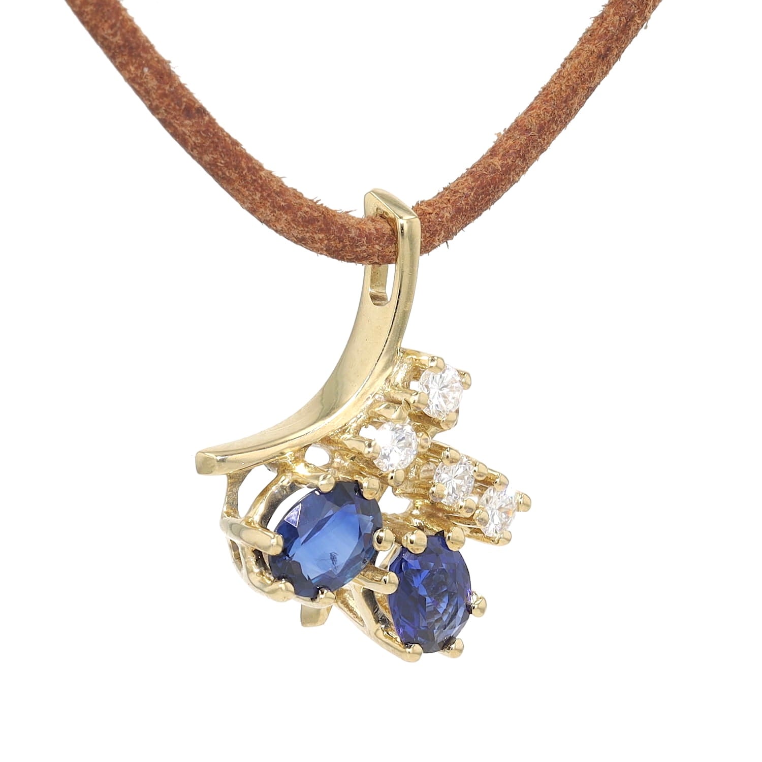 Pendant in 585 yellow gold with blue sapphires and brilliants, hanging turned to the right