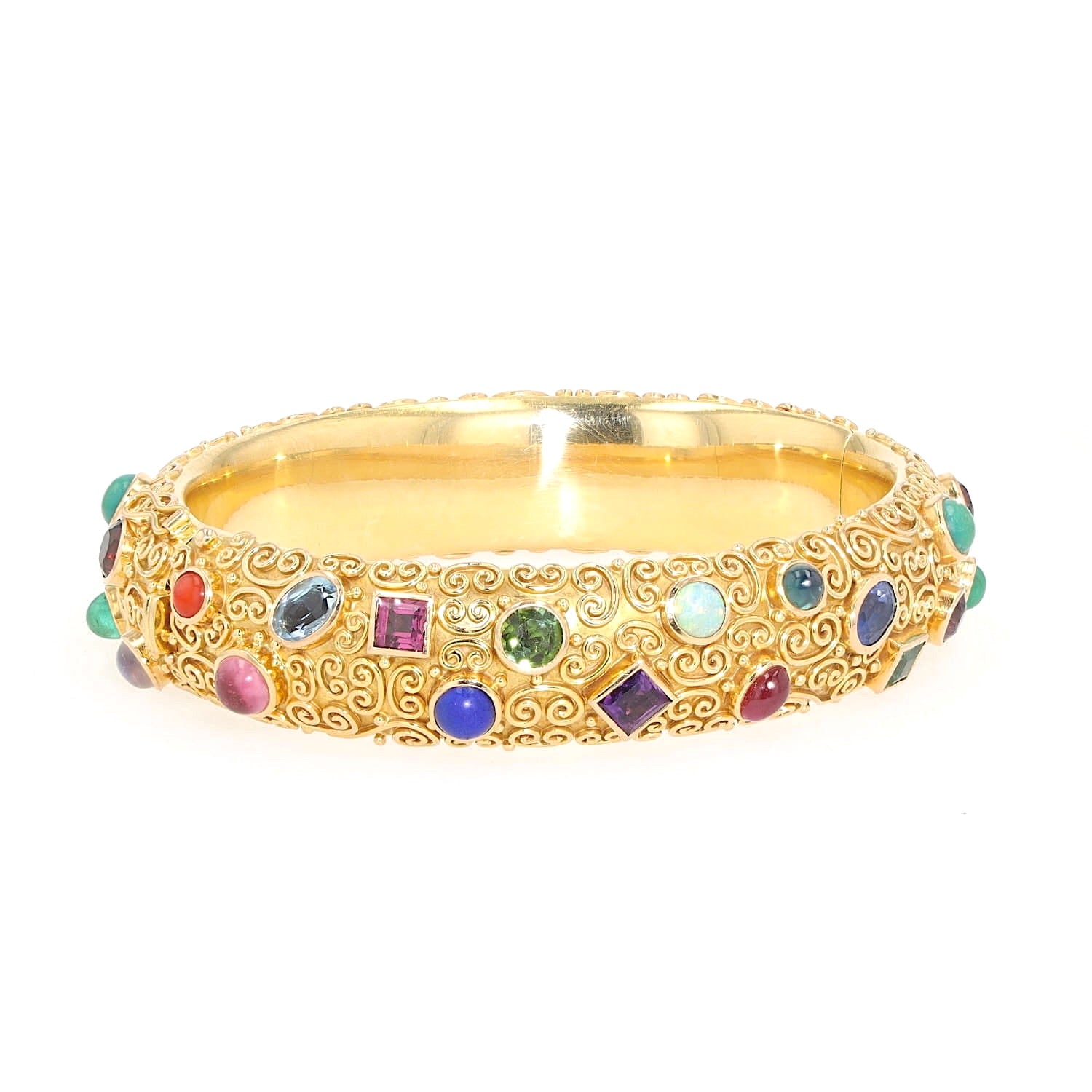 Bracelet by Eugen Hirner in 750 yellow gold with various colorful gemstones, turned horizontally to the right