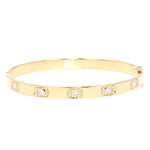 Bangle in 750 yellow gold with a total of approx. 0.60 ct brilliants, lying frontally