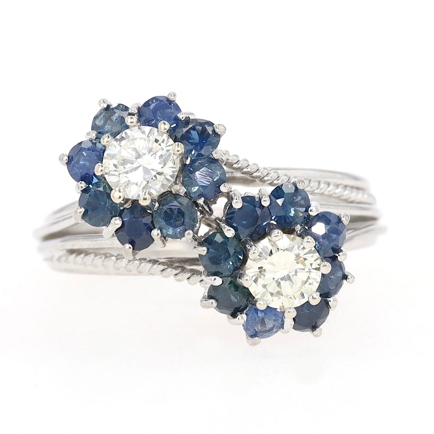 Vintage ring in 750 white gold with brilliants and blue sapphires, lying frontally