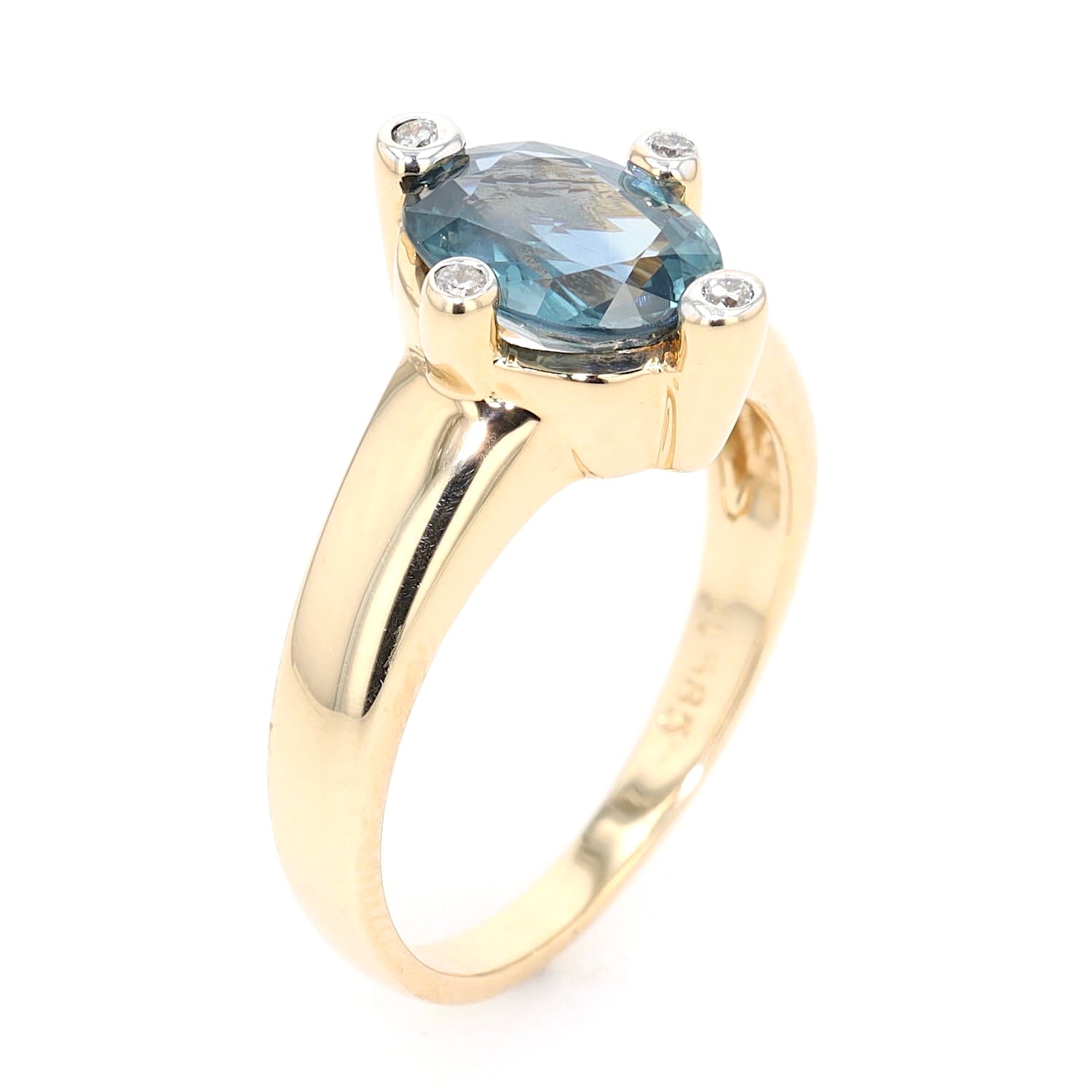 Ring in 585 yellow gold with a blue sapphire and brilliants, standing